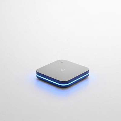 Modern smart home security system hub on a clean white surface with subtle blue light, no text, no words, no typography, clean image, 8K